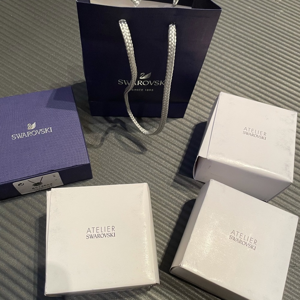3 Swarovski boxes and one bag